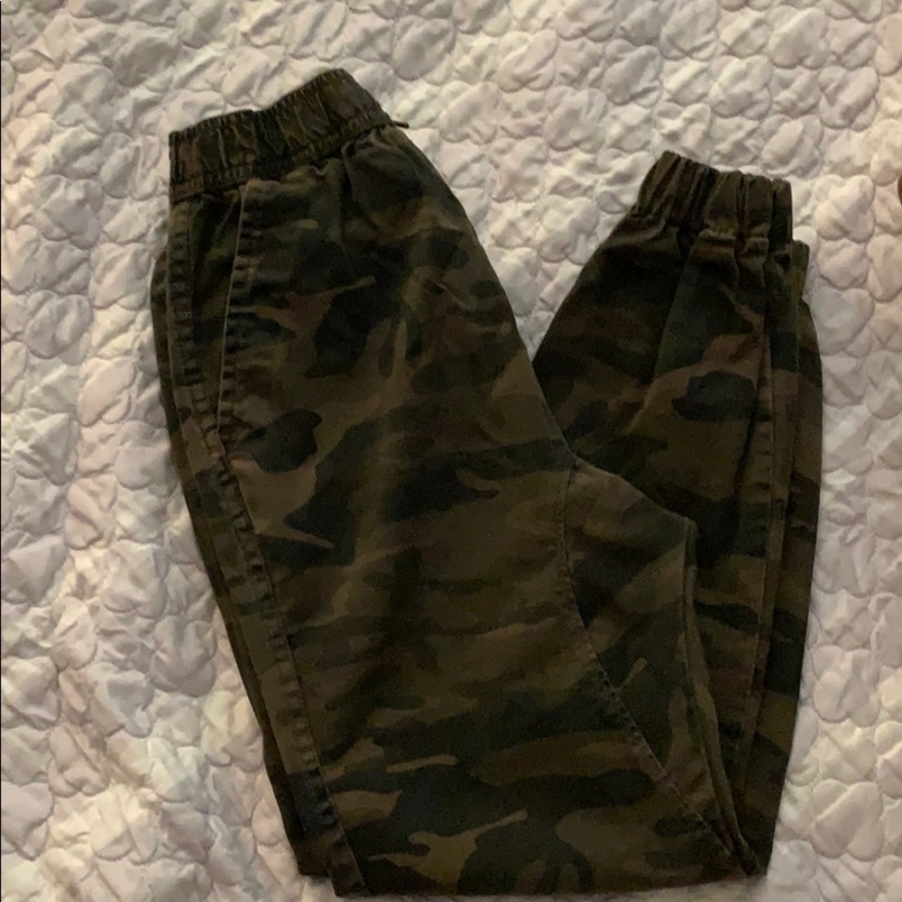 Camo pants, cuffed legs and elastic waist.